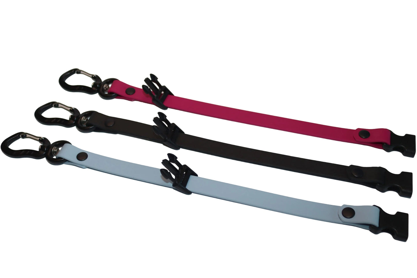 Three handmade BioThane Long Line Keepers by DoggoZ in Husky Blue, Black, and Magenta Pink, featuring black carabiner hooks and durable buckles for organized dog lead storage leash keeper long line holder
