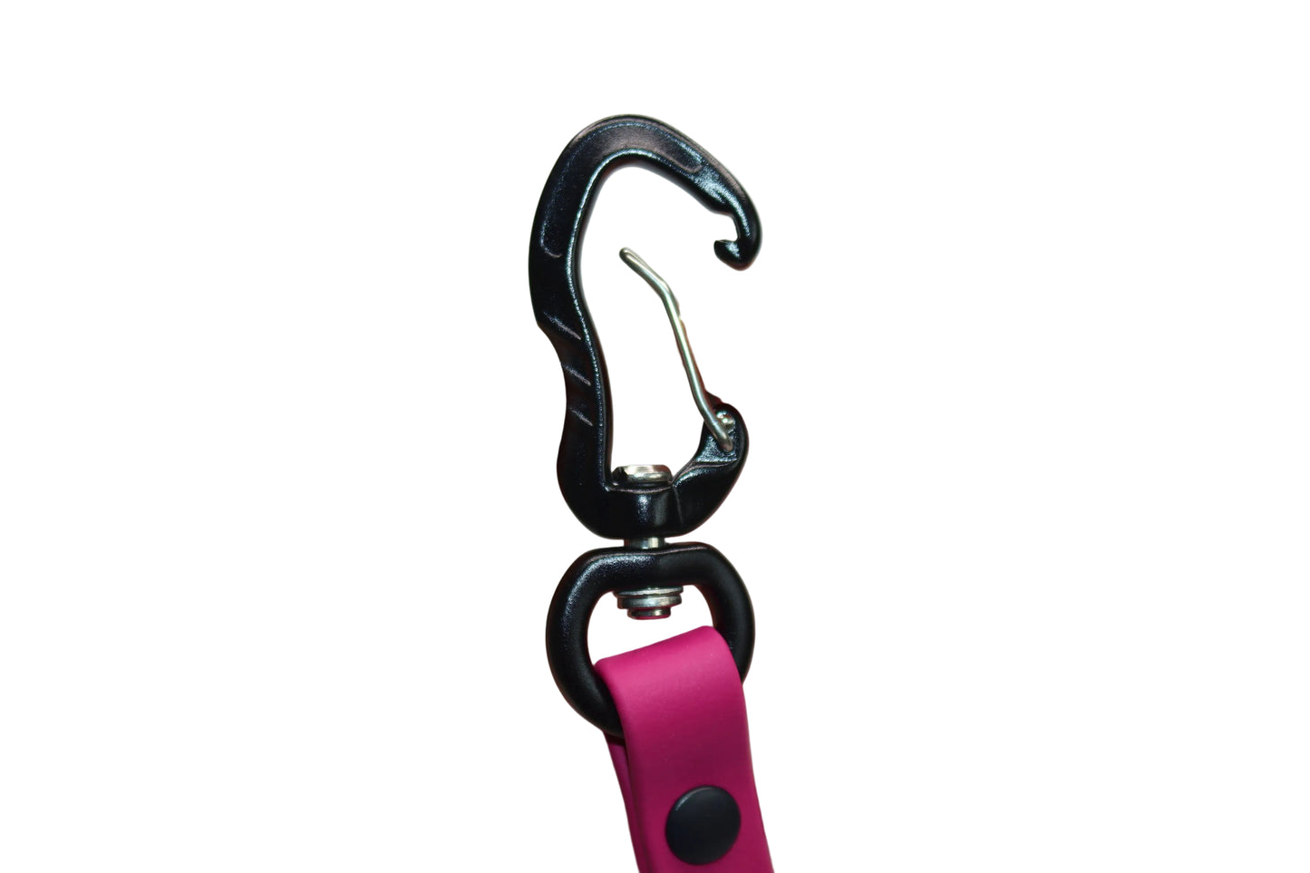 Close-up of a heavy-duty black swivel snap hook attached to a pink BioThane dog leash by DoggoZ, biothane accessories, The hardware is designed for strength and security, featuring a matte black finish and secure rivet assembly, ideal for handmade durable dog gear.