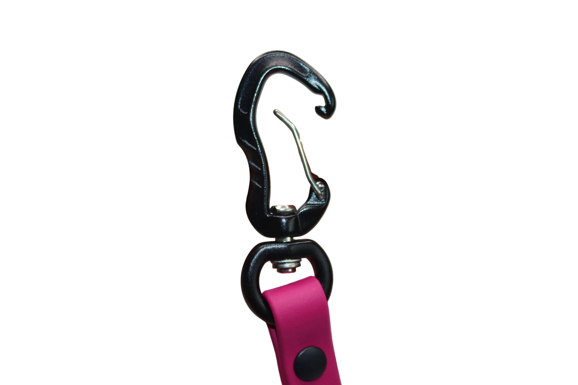 Close-up of a heavy-duty black swivel snap hook attached to a pink BioThane dog leash by DoggoZ, biothane accessories, The hardware is designed for strength and security, featuring a matte black finish and secure rivet assembly, ideal for handmade durable dog gear.